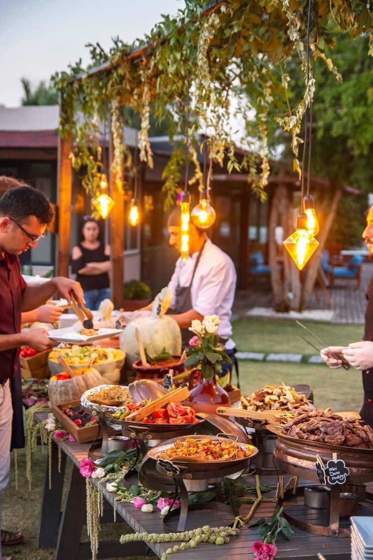 Rustic catering spread at golden hour